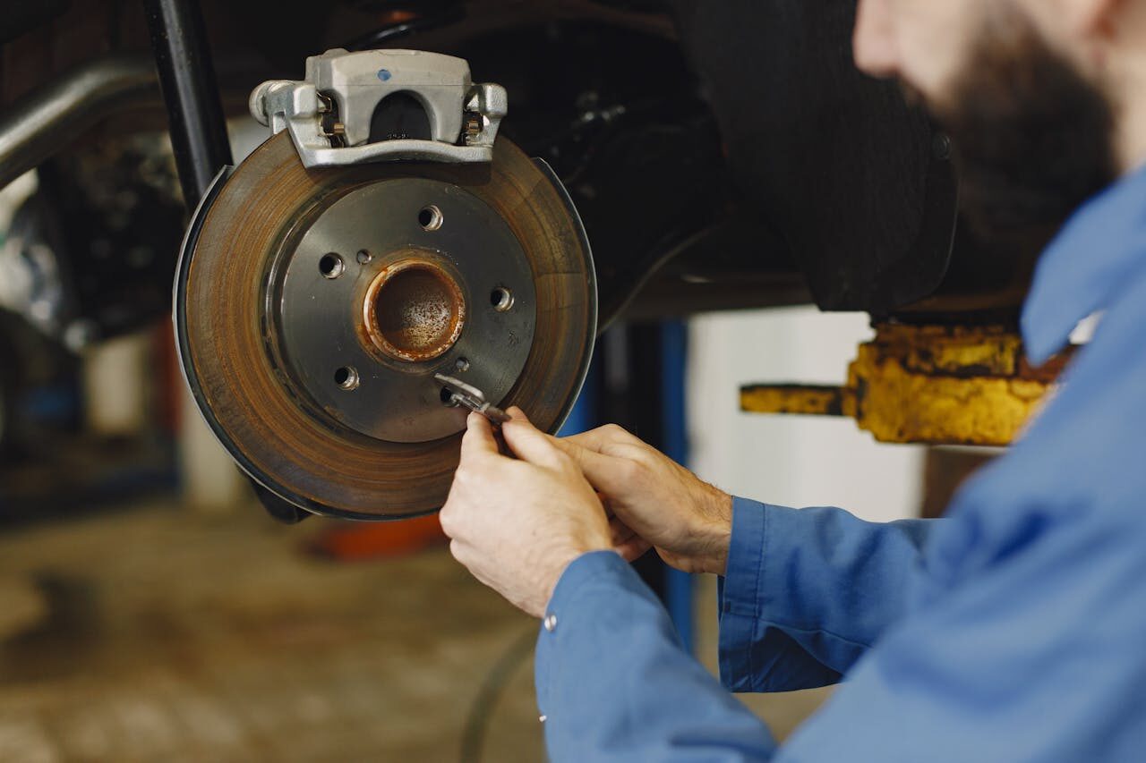 Technician Checking the brake